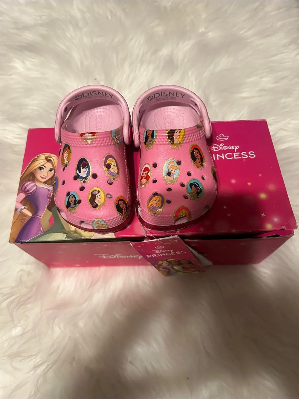 New in box pink Disney princess crocs size. 5c